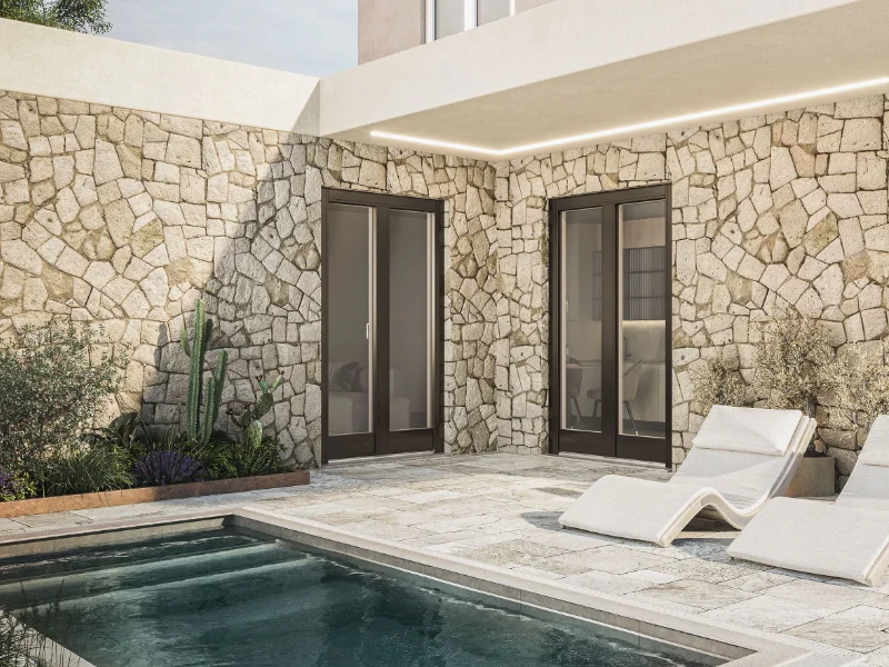 outdoor-con-parete-in-pietra-e-piscina